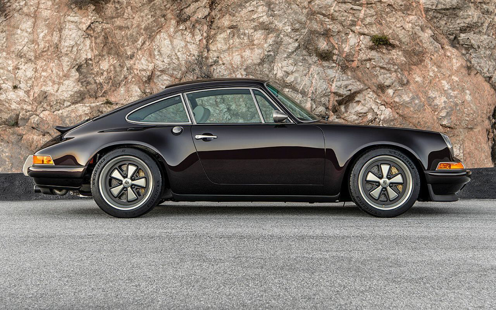 Singer Shares Austin Commission in Aubergine