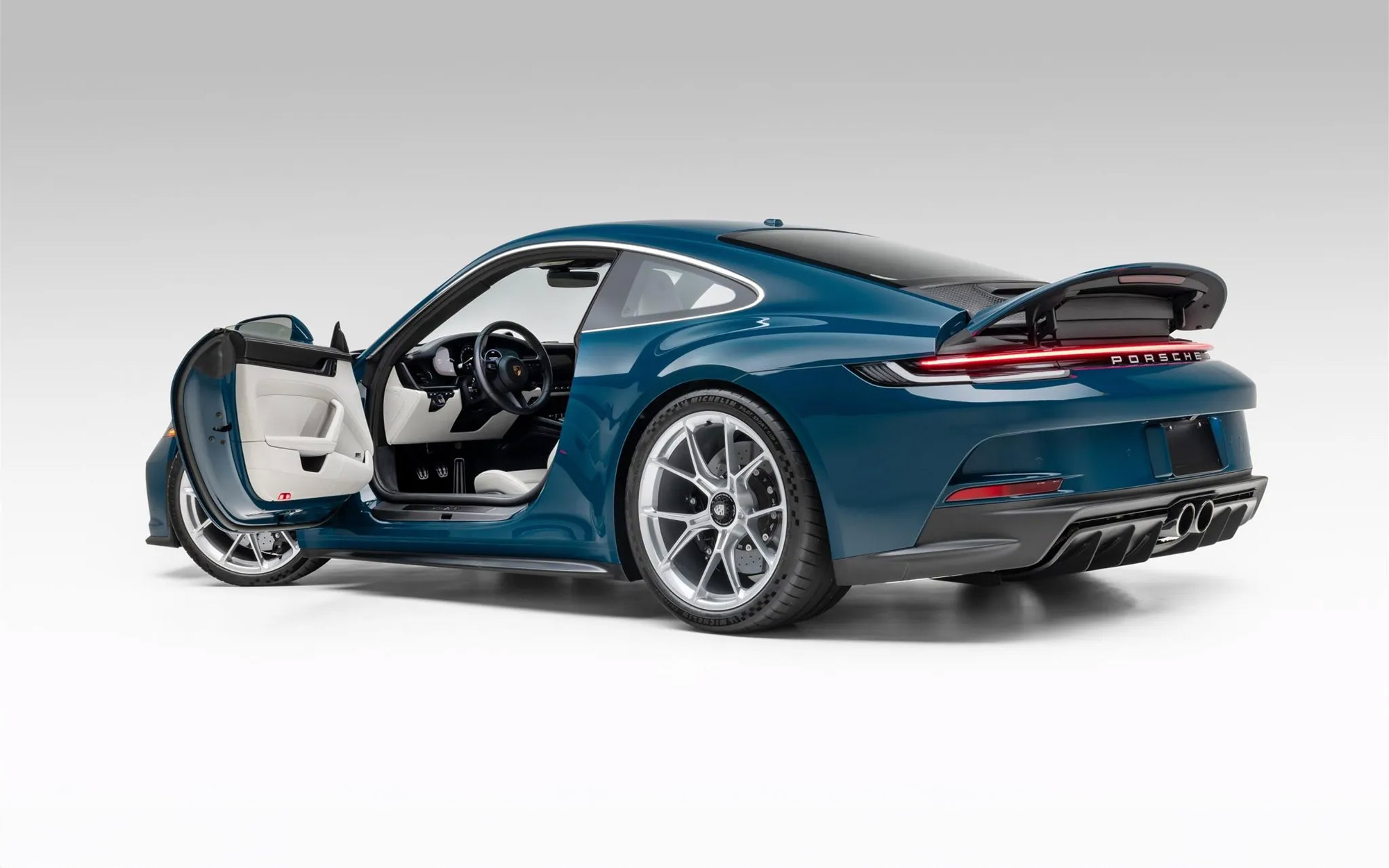 Market Find: 2022 Porsche 911 GT3 Touring 6-speed in PTS Fjord Green on BaT